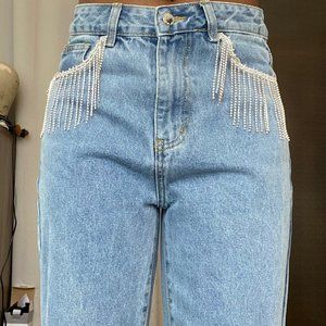 Jeans with crystal tassels